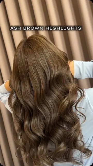 Ash brown highlights on long hair at Alora Mom&Me Gading Serpong